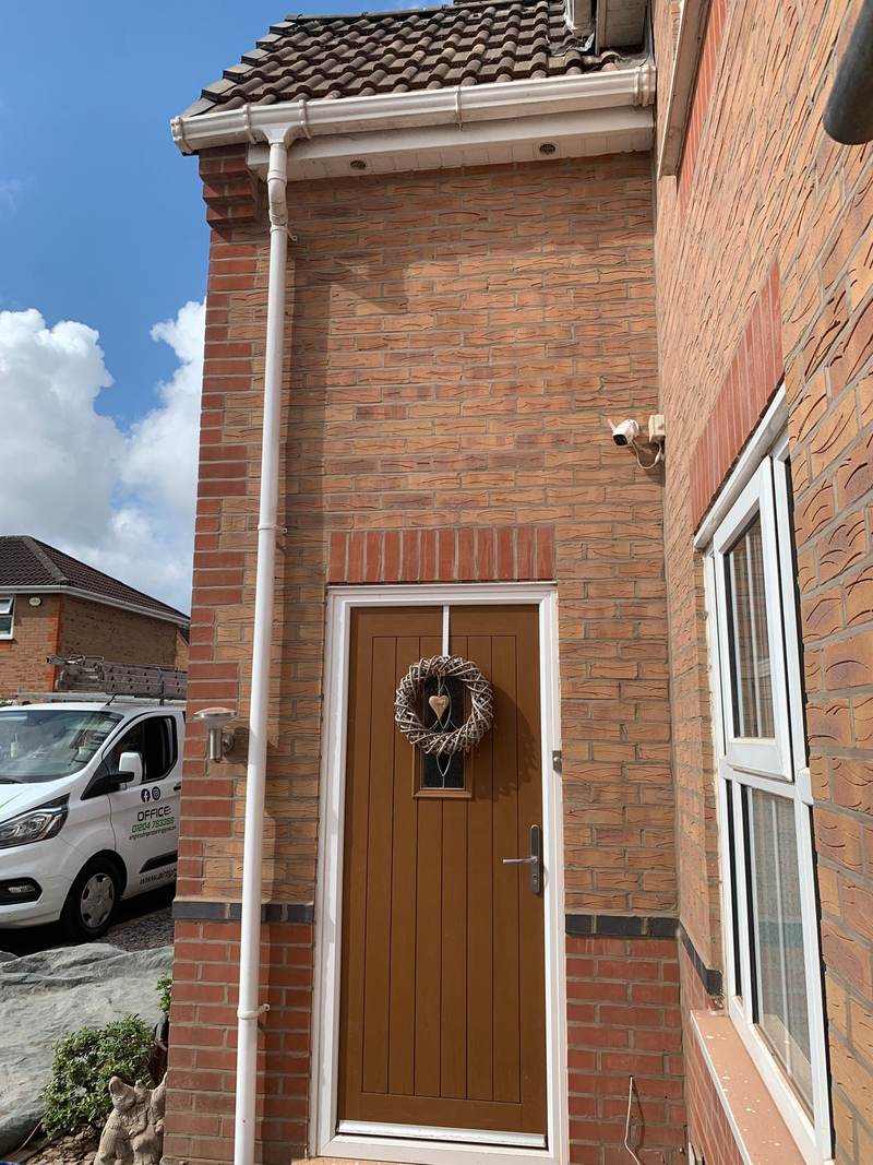Cleaned brickwork around a front door in Bolton